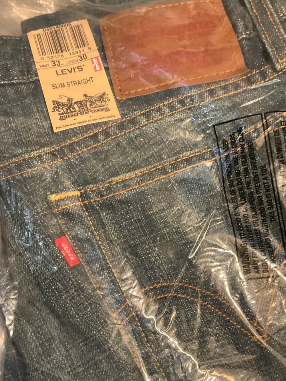 Levi's Slim Straight Men's Jeans - Indigo with Tan Patch